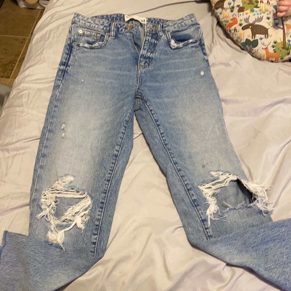 High waisted blue jeans mom style